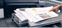 Printed pages being reviewed